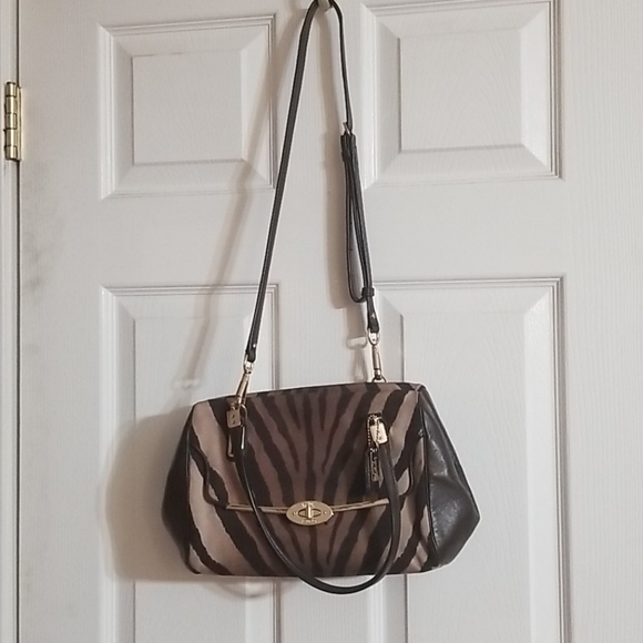 Coach Handbags - Coach brown Zebra purse gently used I do not accep
